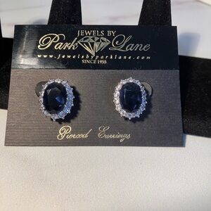 Elegant Diana earrings in Silvertone. Precision cut cubic zirconia.